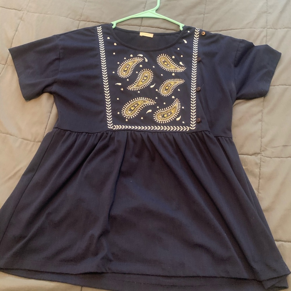 Navy embroidered peplum shirt